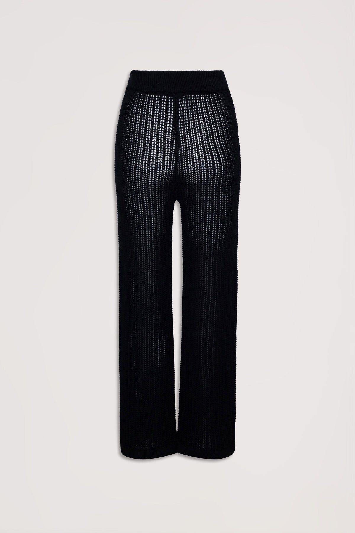Black crochet pants with a relaxed fit and textured open knit design, styled for effortless everyday wear.