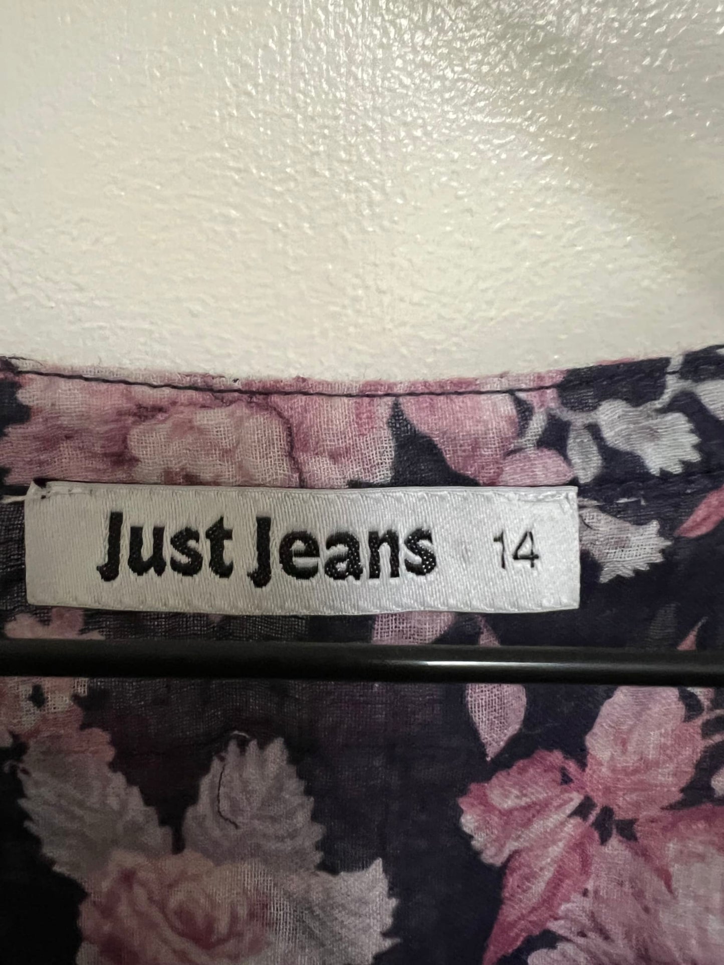 115084
