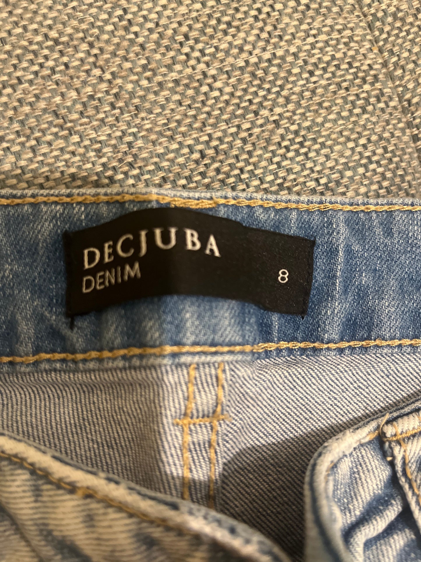 11049