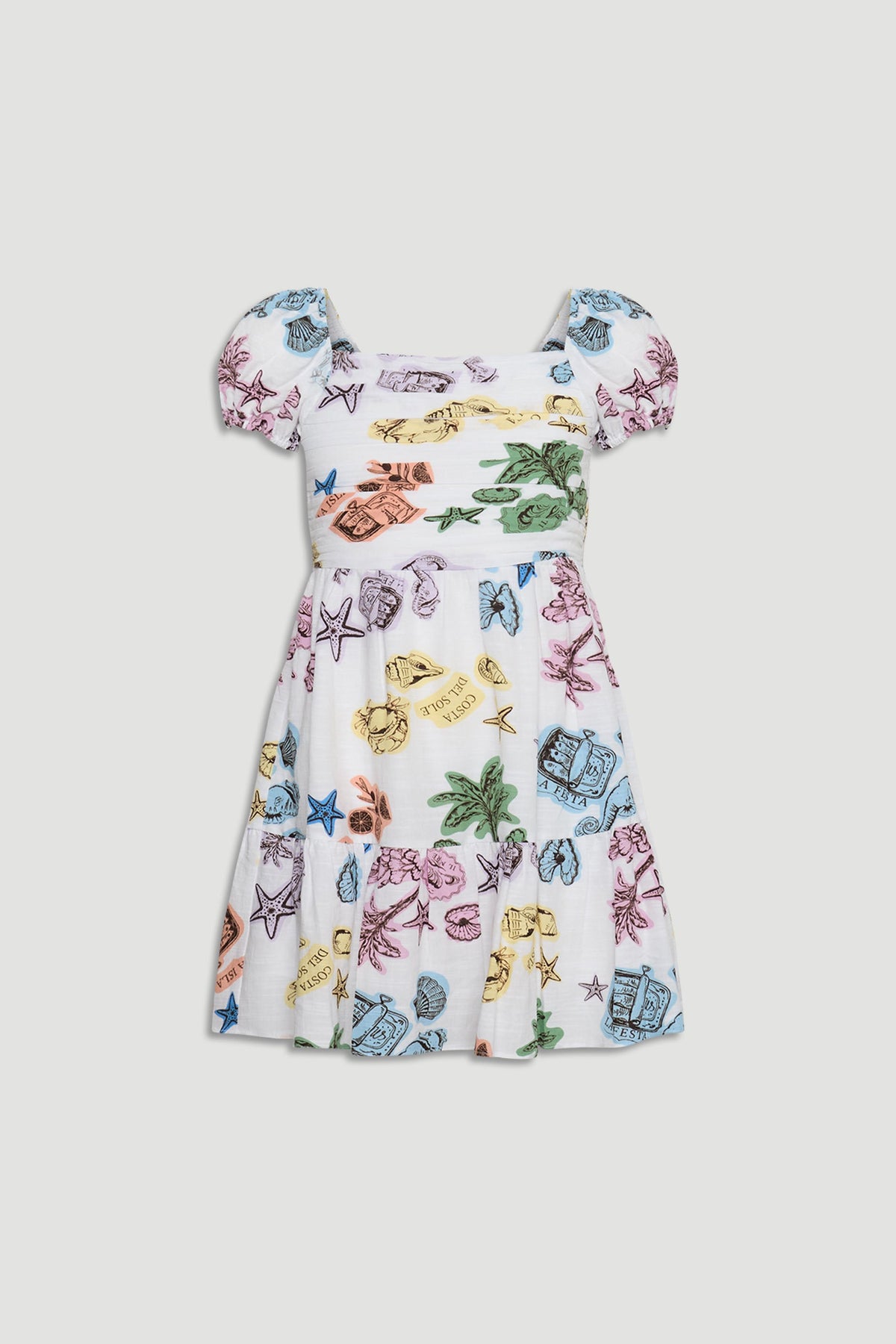 White mini dress with puff sleeves featuring colorful tropical and beach-themed prints in pastel shades