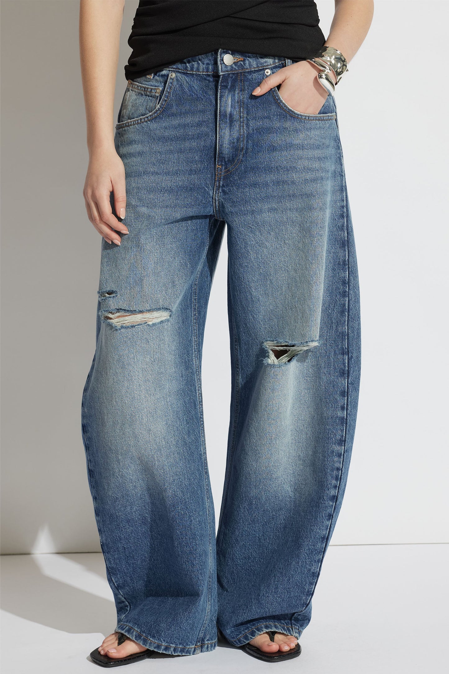 Daisy Ripped Horseshoe Jean