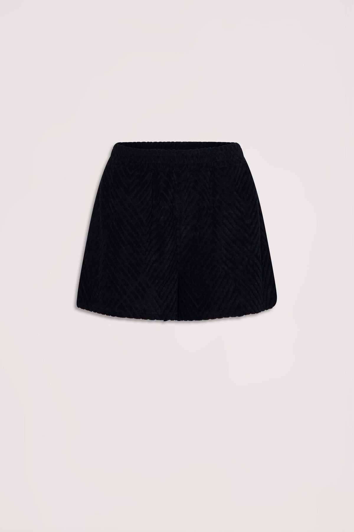 Black textured terry shorts with a relaxed fit and elastic waistband against a neutral background