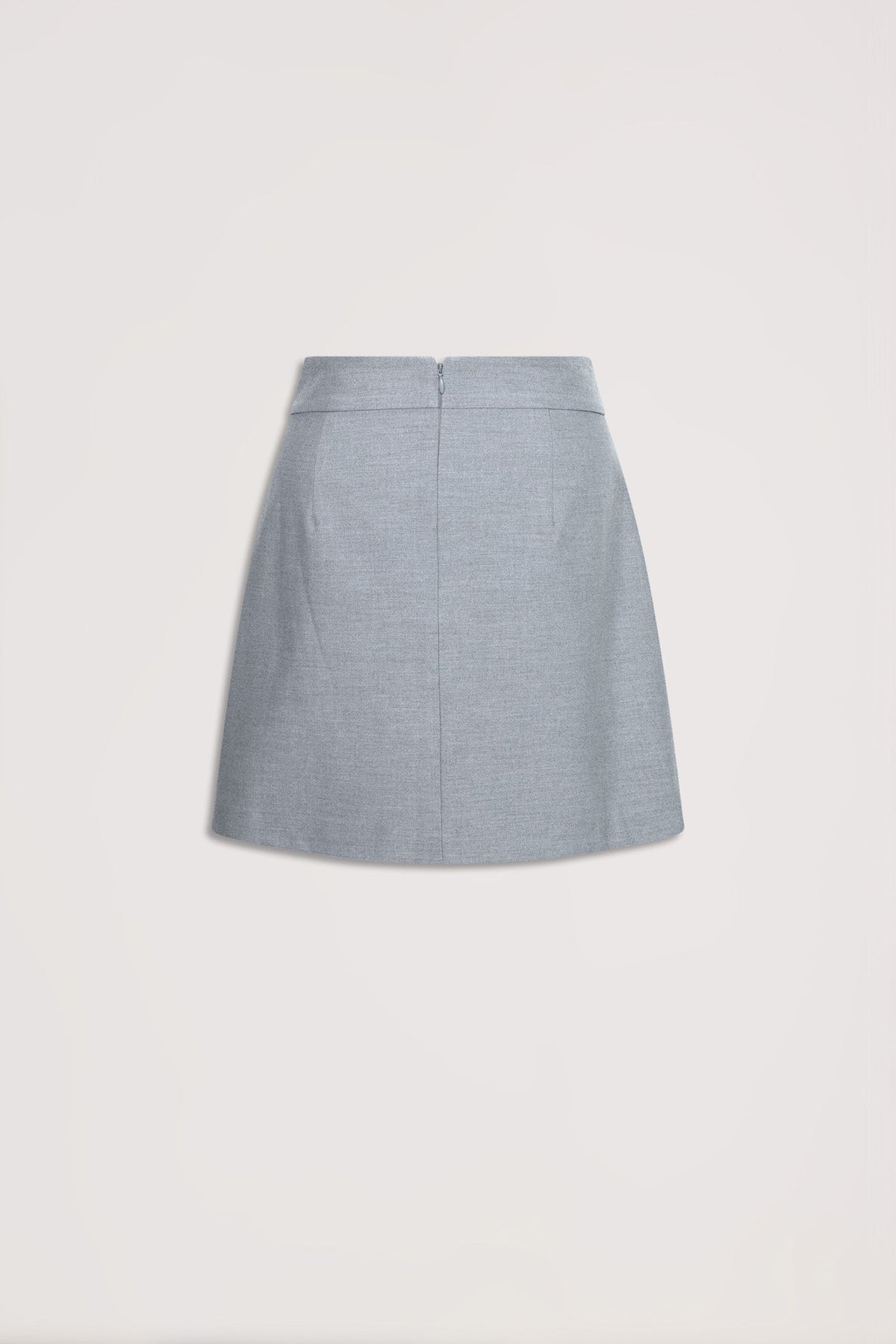 Light grey asymmetric mini skirt with subtle texture, featuring a high waist and back zipper closure, laid flat.