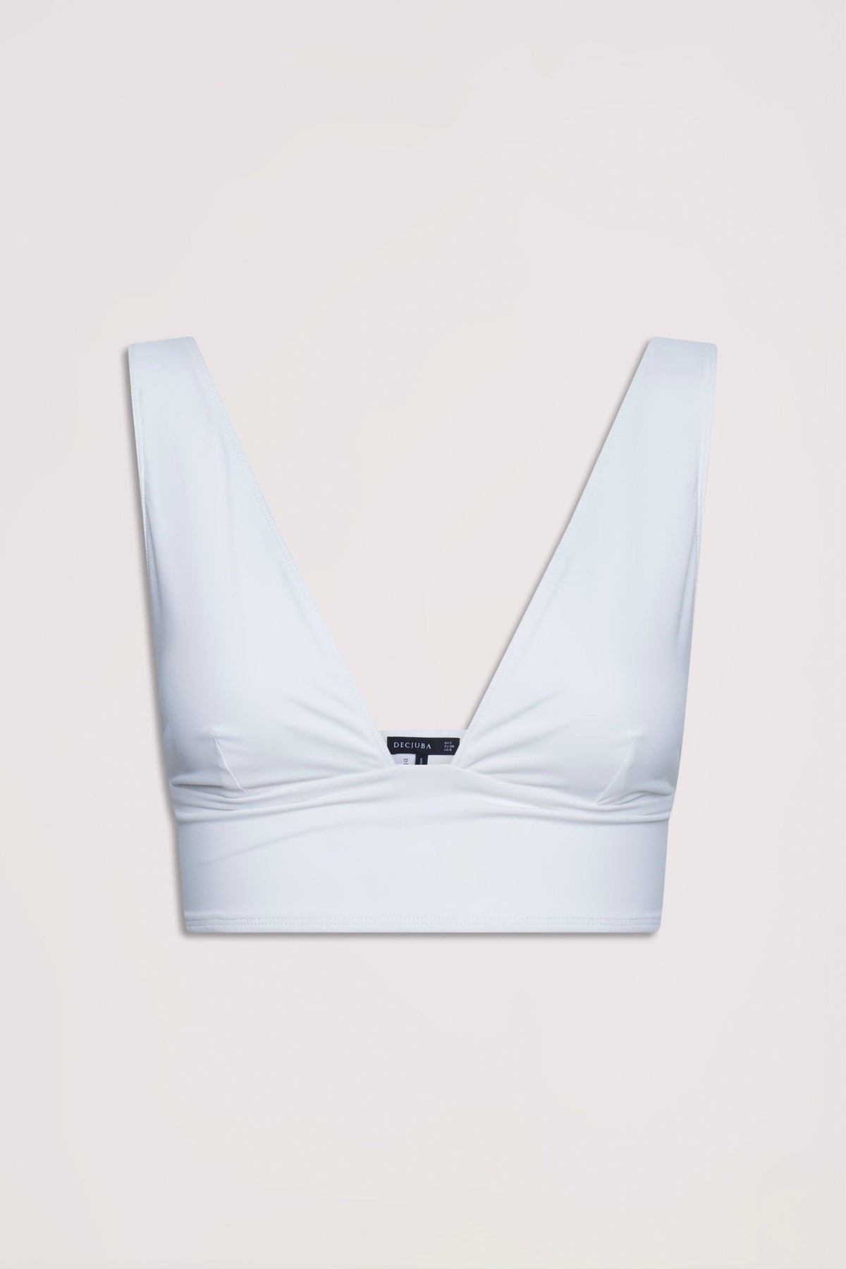Ivory bralette with wide straps and deep V neckline, featuring a stretchy and neat fit for everyday wear.