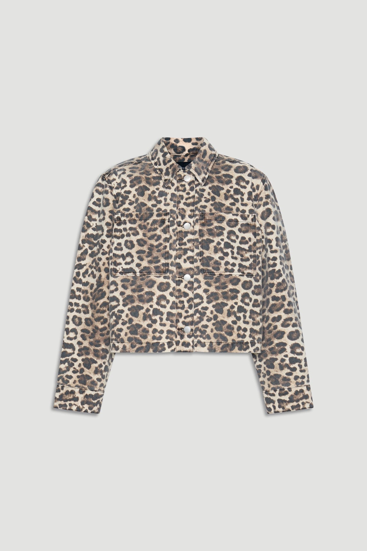 Leopard print cropped denim shacket with long sleeves and front chest pockets in neutral tones.