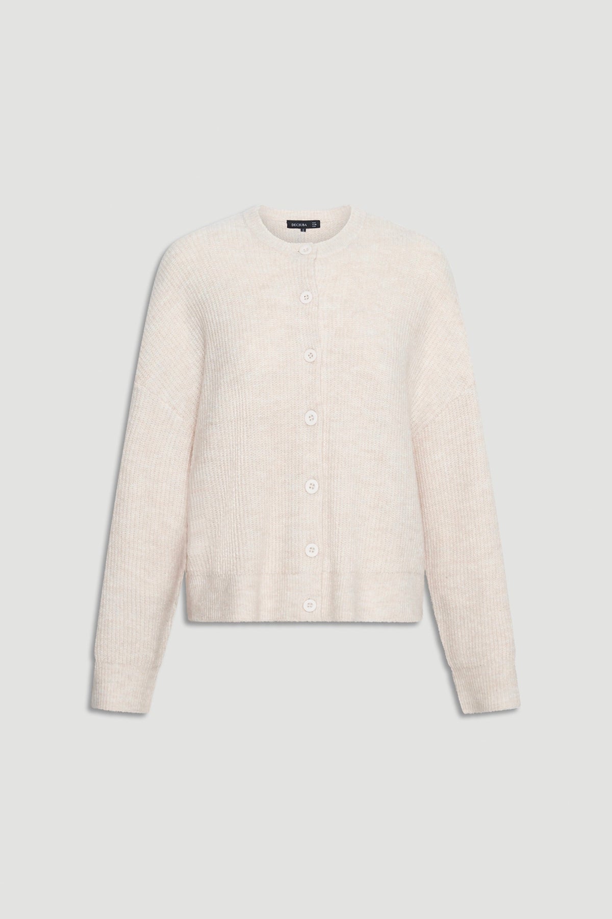 Soft textured cream knit cardigan with full button front and relaxed long sleeves for cozy layering.