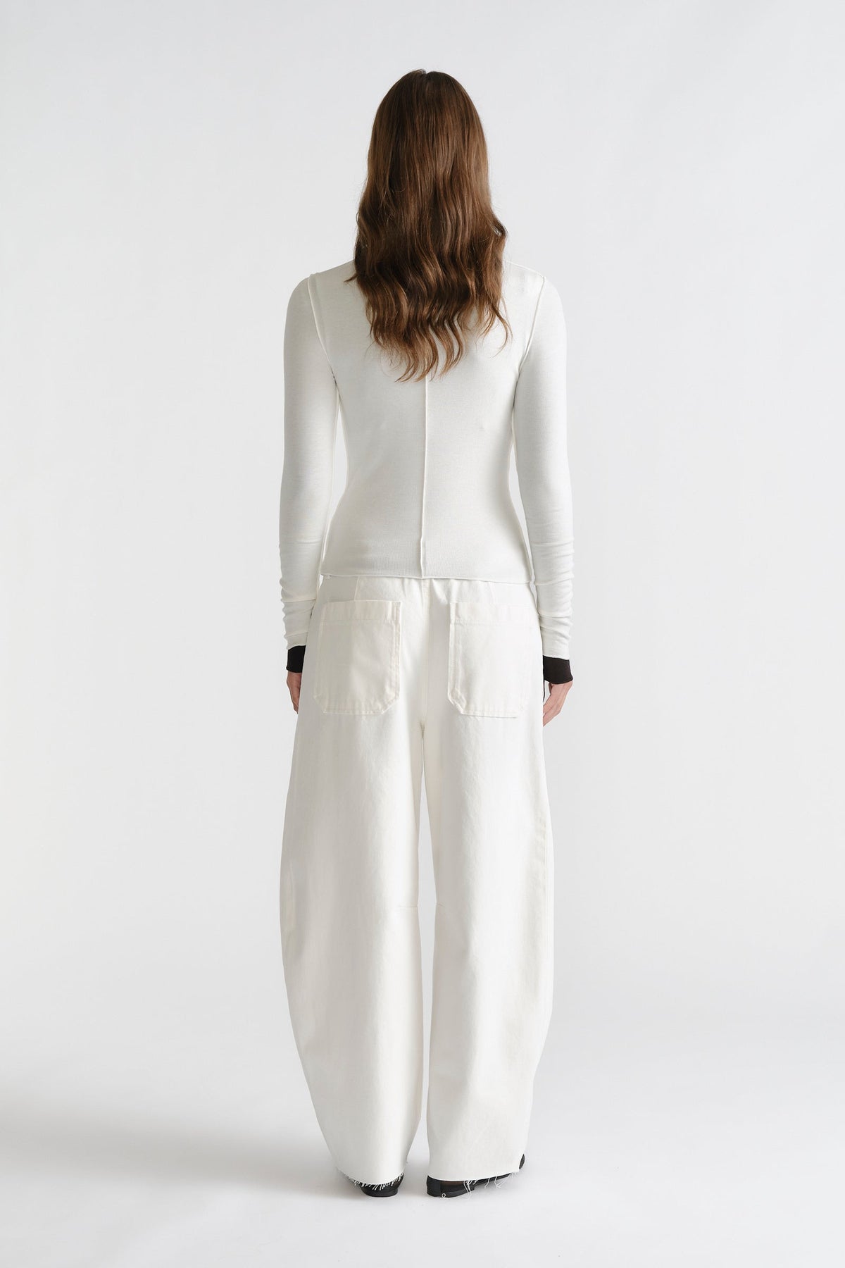 D-Luxe Horseshoe Jean in relaxed white denim with wide legs and patch pockets by DECJUBA Australian fashion brand