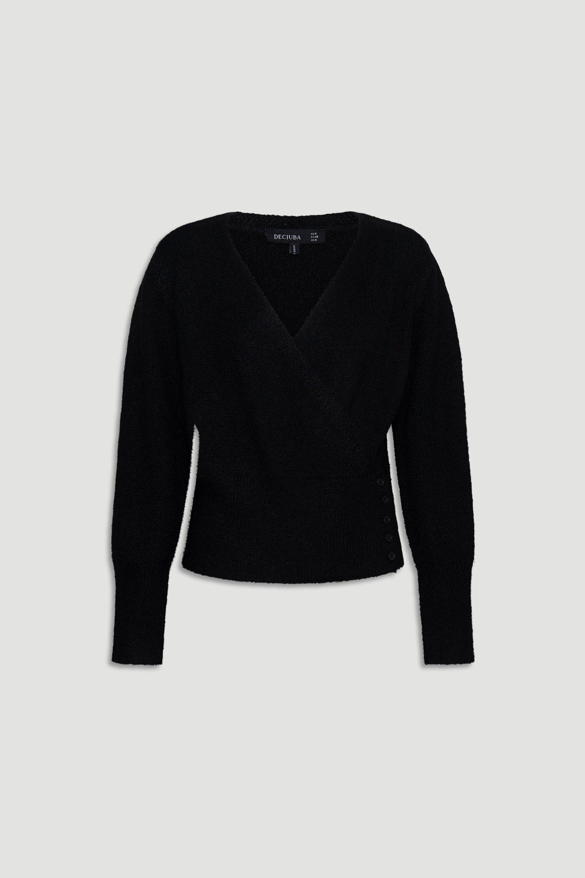 Soft black knit cardigan with a crossover front and subtle button detailing on the side for a flattering fit