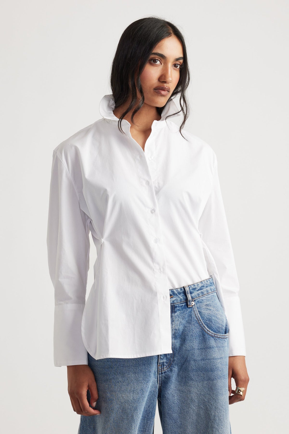 Kristy Side Button Shirt in crisp white with a structured collar and relaxed fit by DECJUBA Australian fashion brand