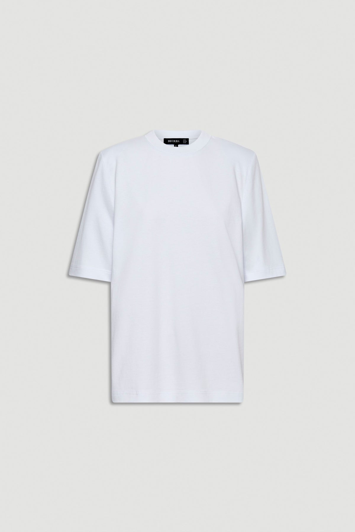 White tee featuring structured shoulder pads and a relaxed fit for an elevated everyday look.