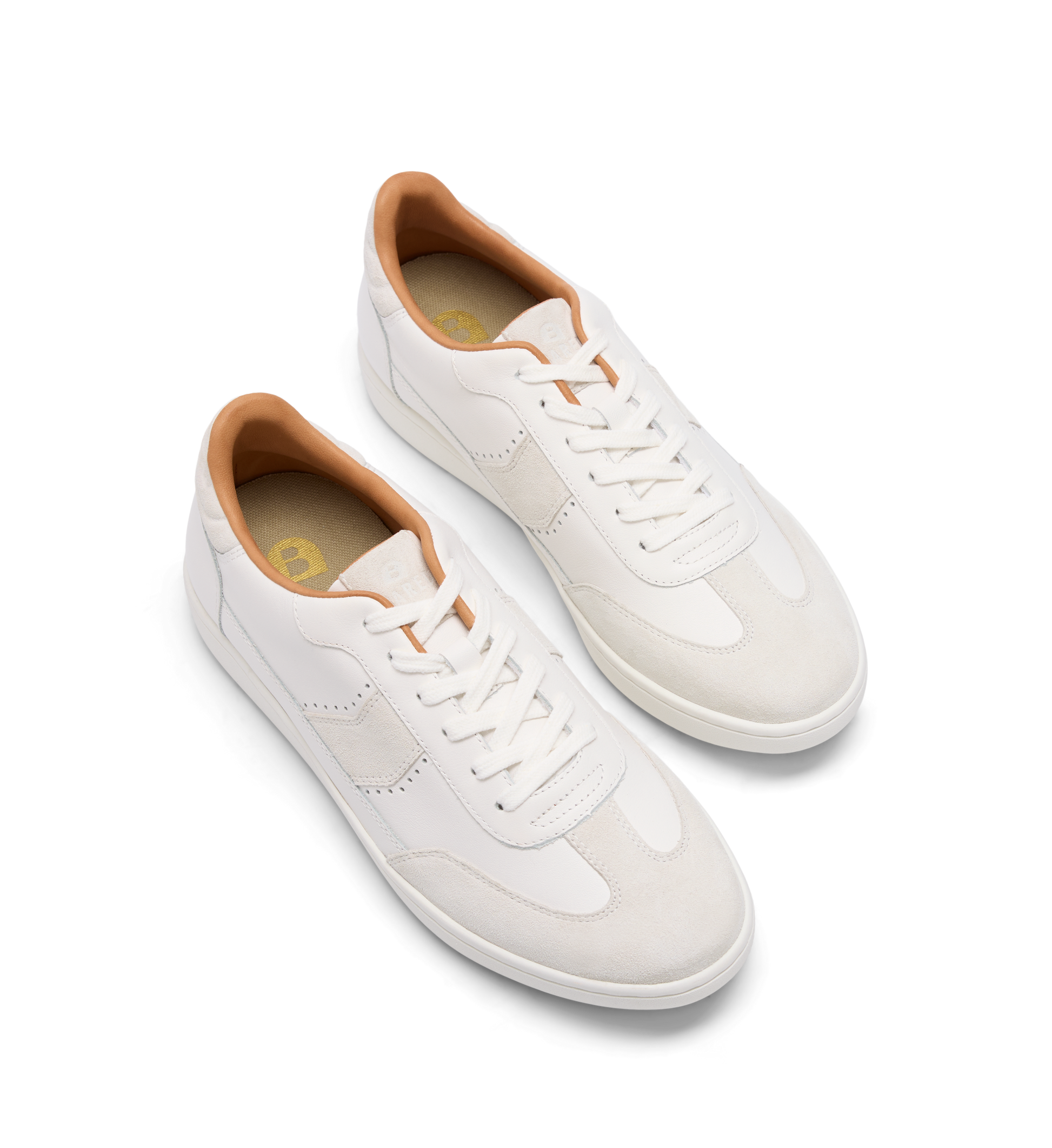 pair of white sneakers for women