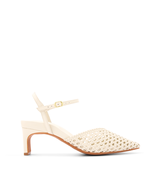 A ecru leather low heel slingback sandal with a pointed toe and gold hardware.