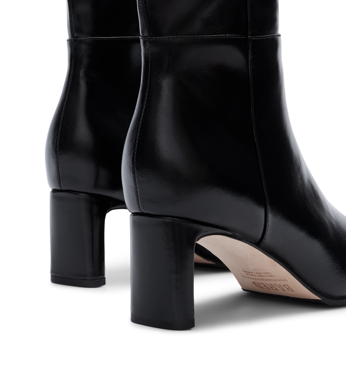black tall boots with a mid heel