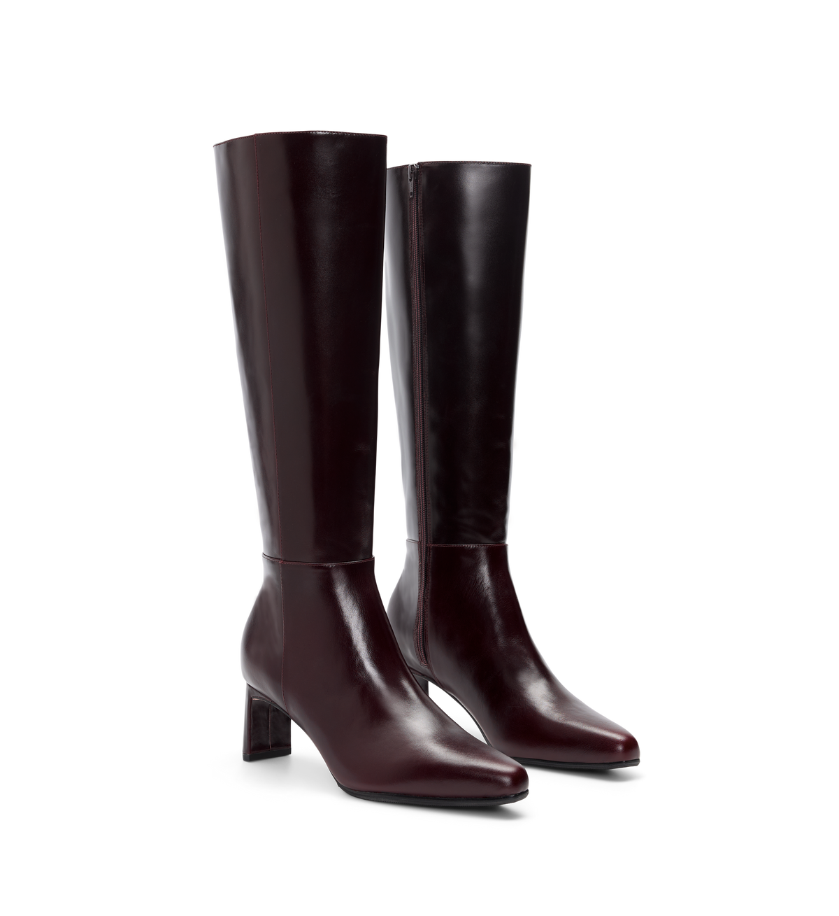 pair of brown knee high boots with side zip and heel