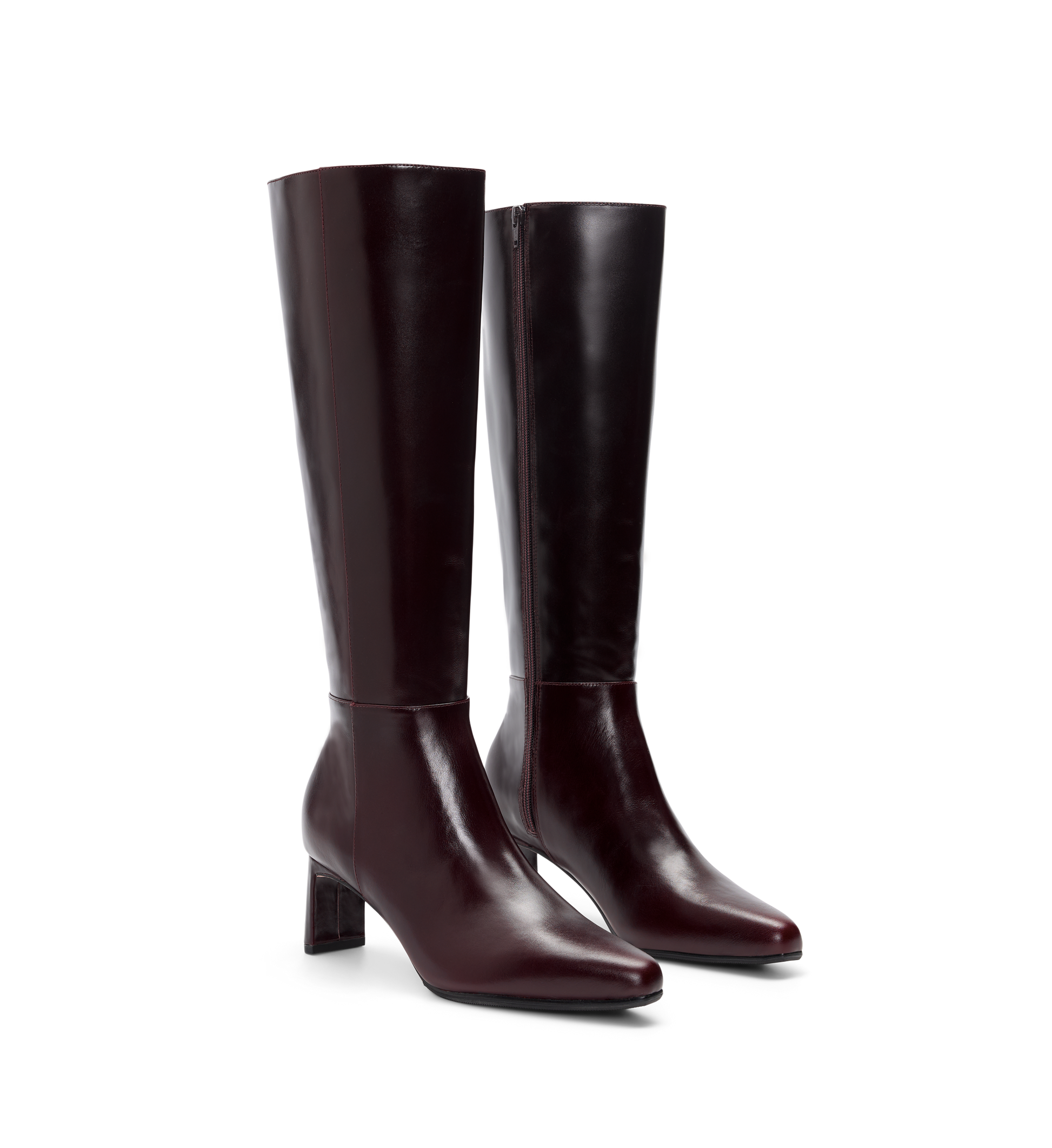 pair of brown knee high boots with side zip and heel