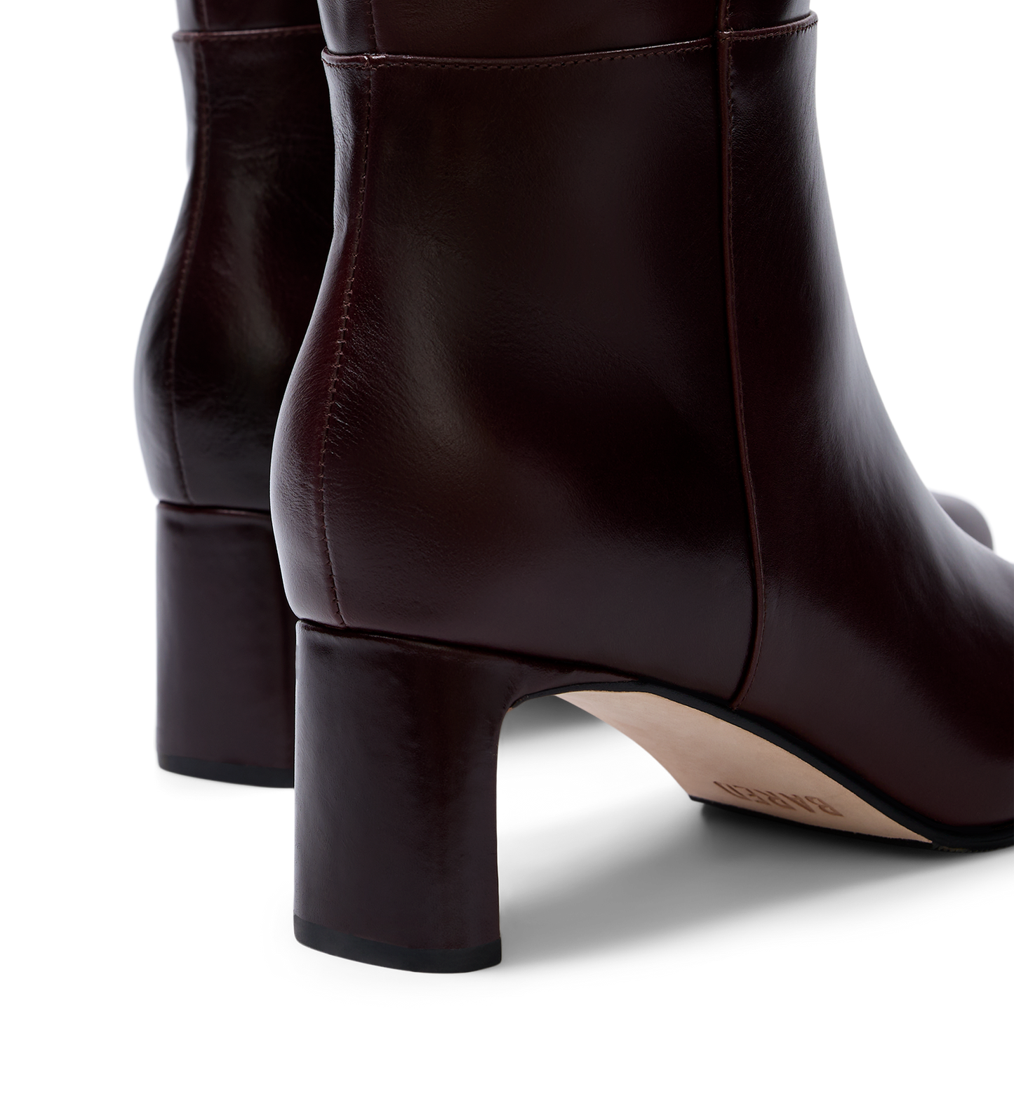 close up on the heel of the cacique brown knee high boots