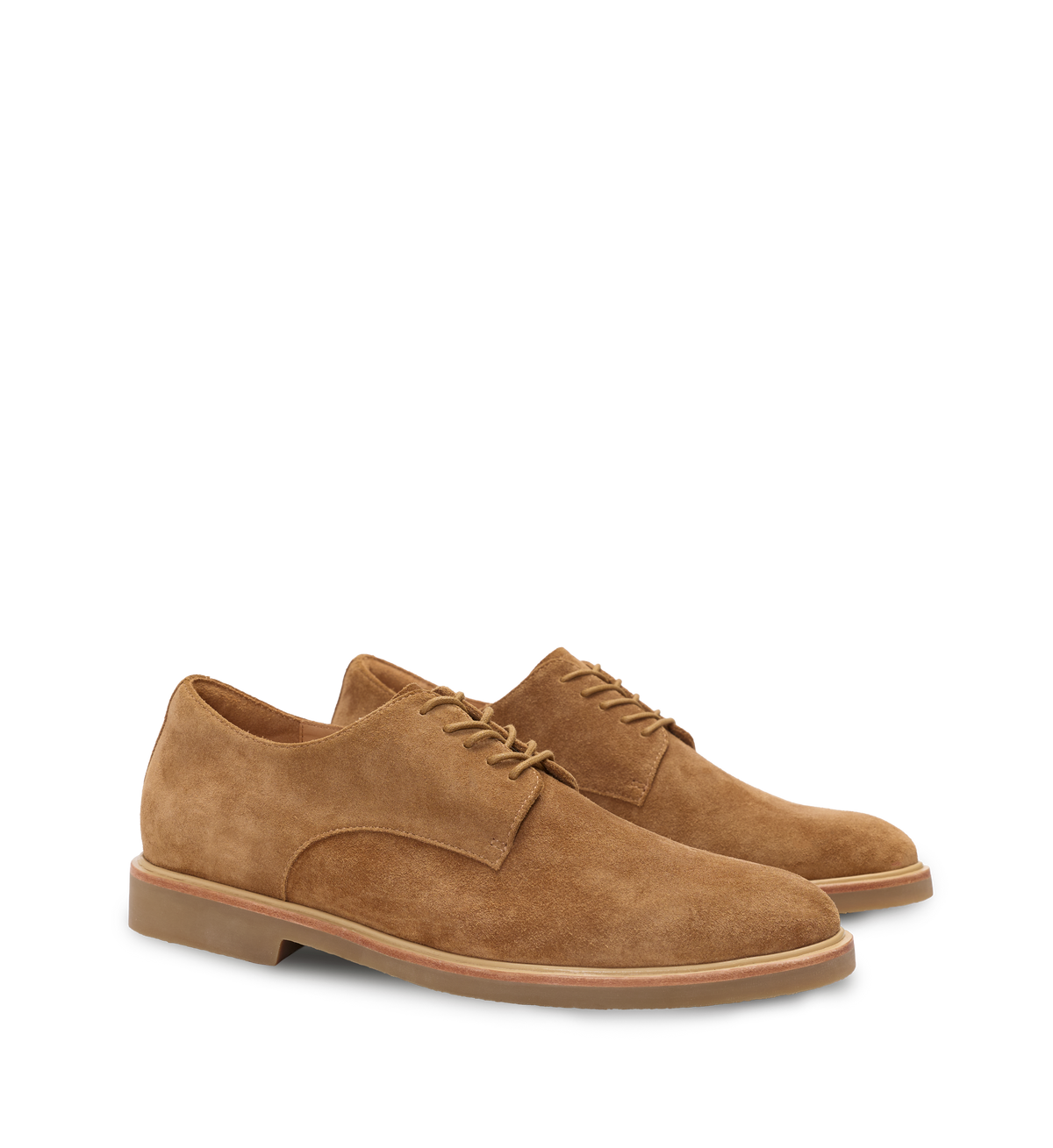 Pair of mens tan suede shoes on a white background