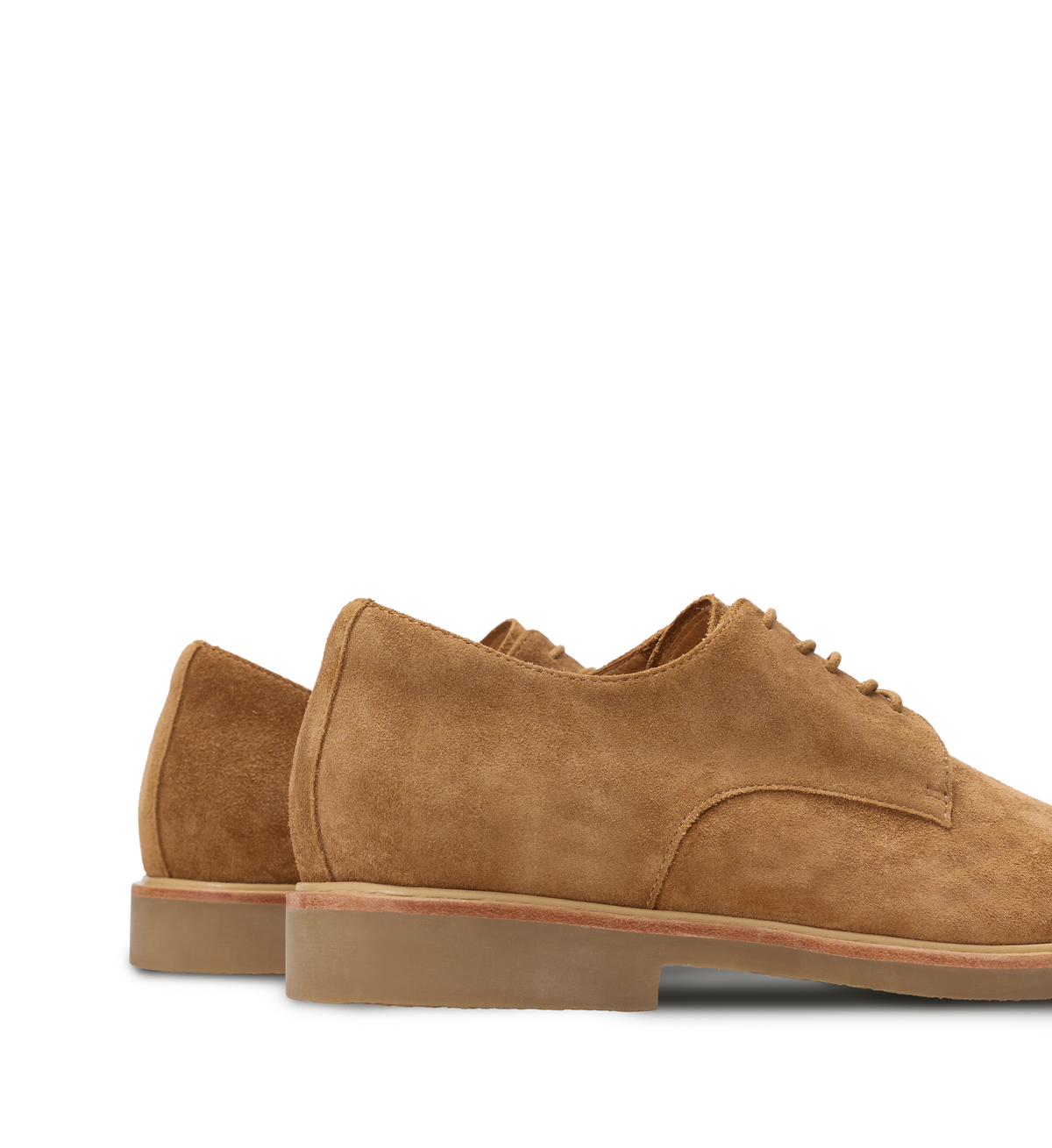 Pair of brown suede shoes on a white background