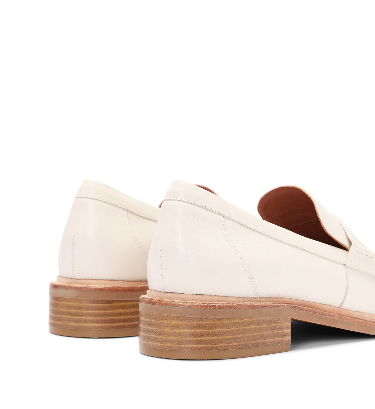close up on the bared footwear ecru loafers