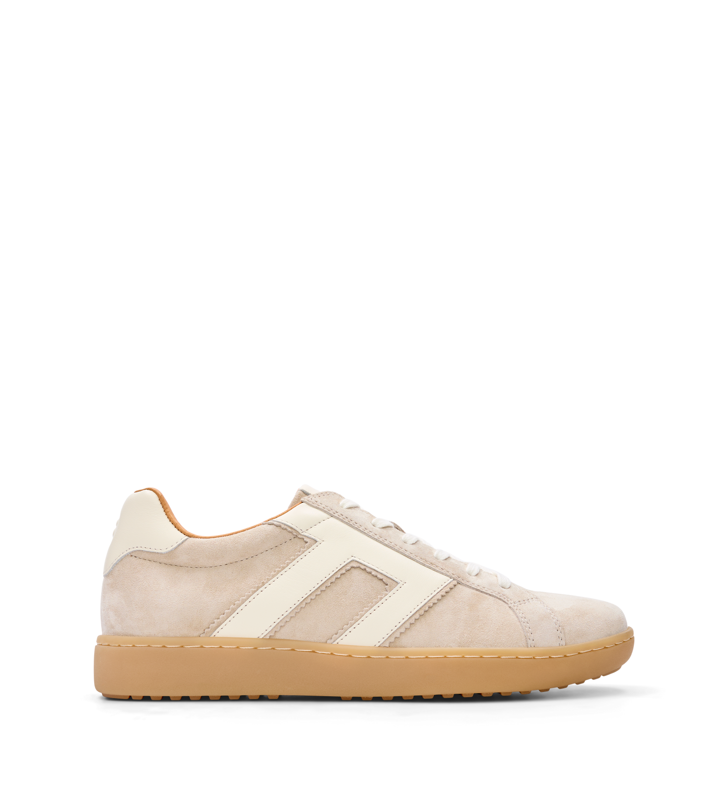 A beige suede sneaker with ecru leather accents and a gum-colored outsole.