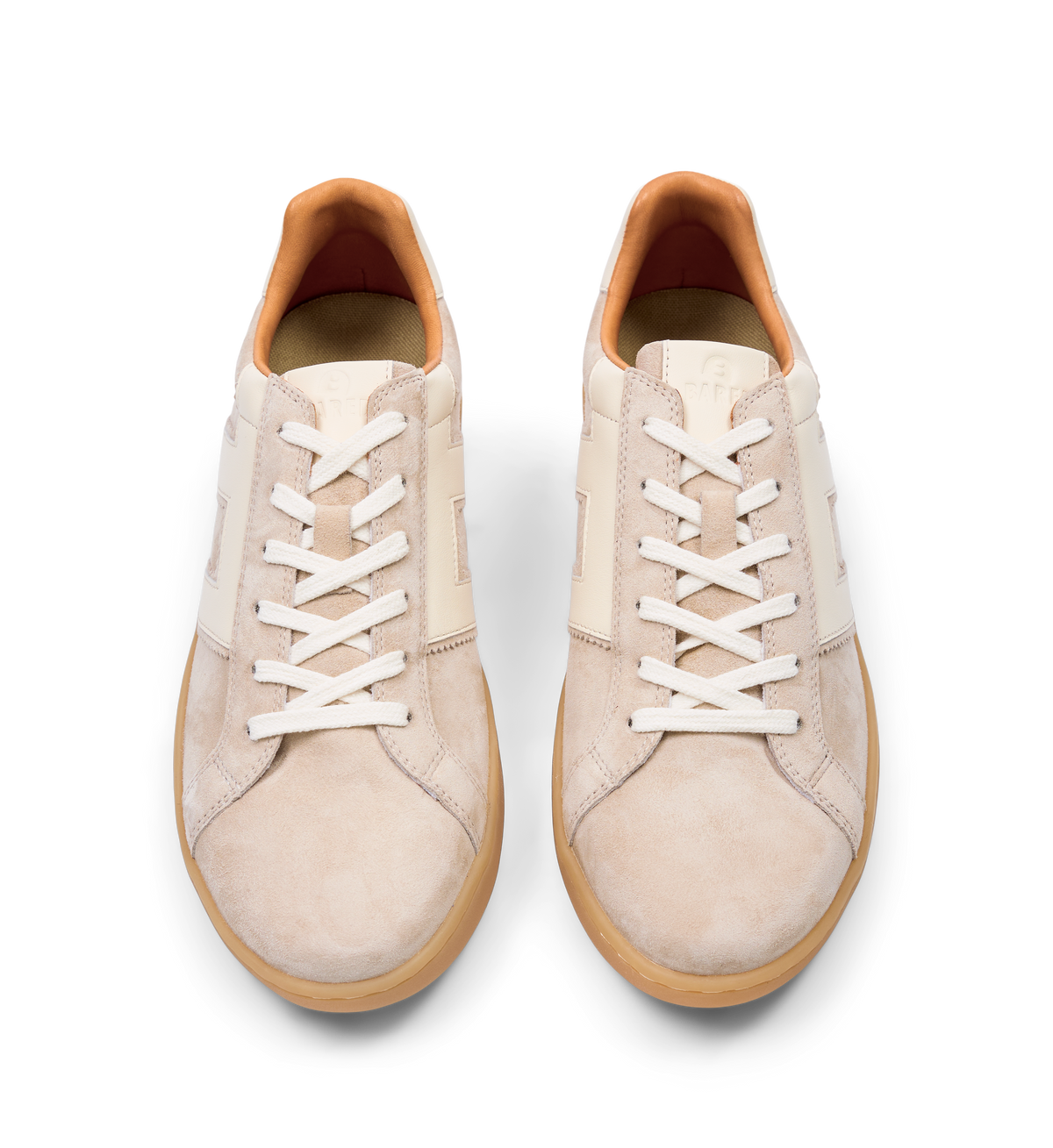 pair of womens beige sneakers in suede