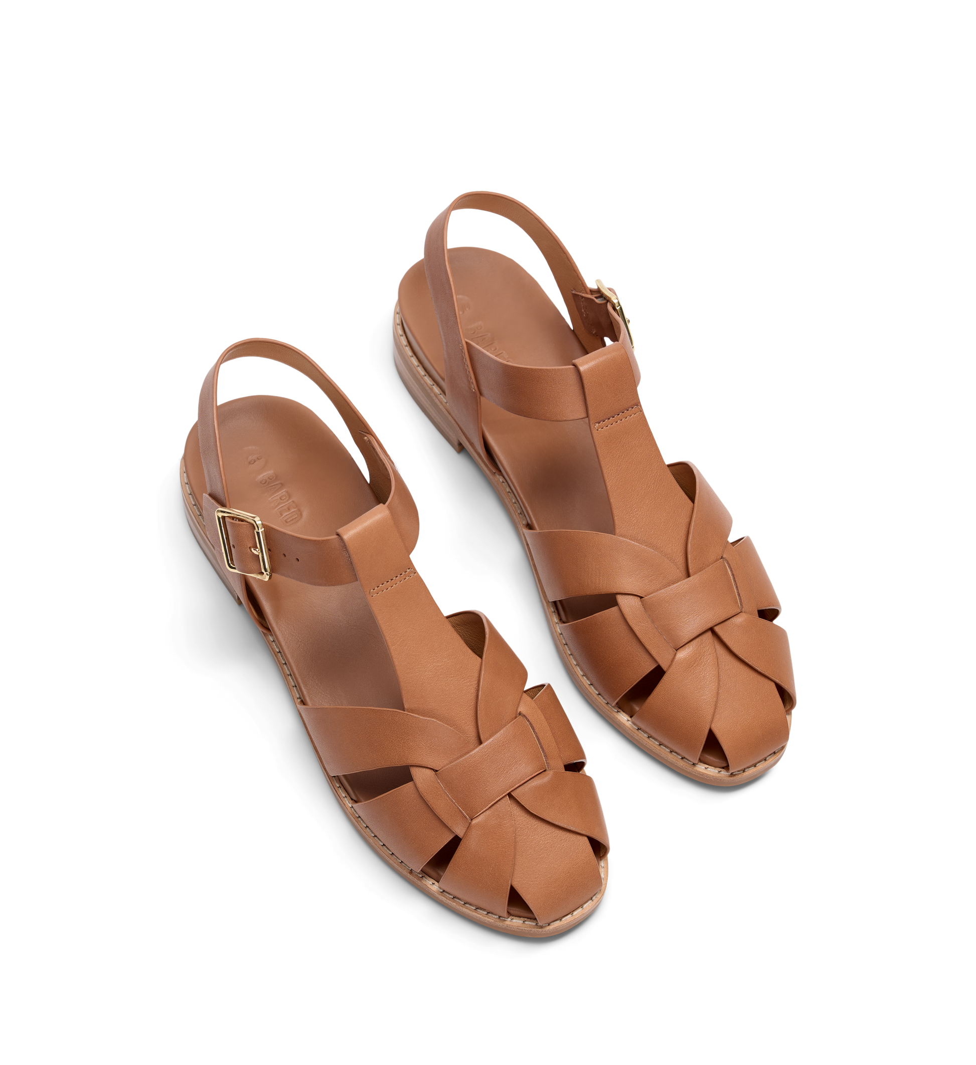 Pair of brown sandals with woven design on a white background