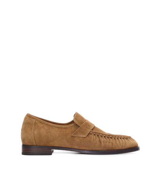 Brown suede loafer on a white background