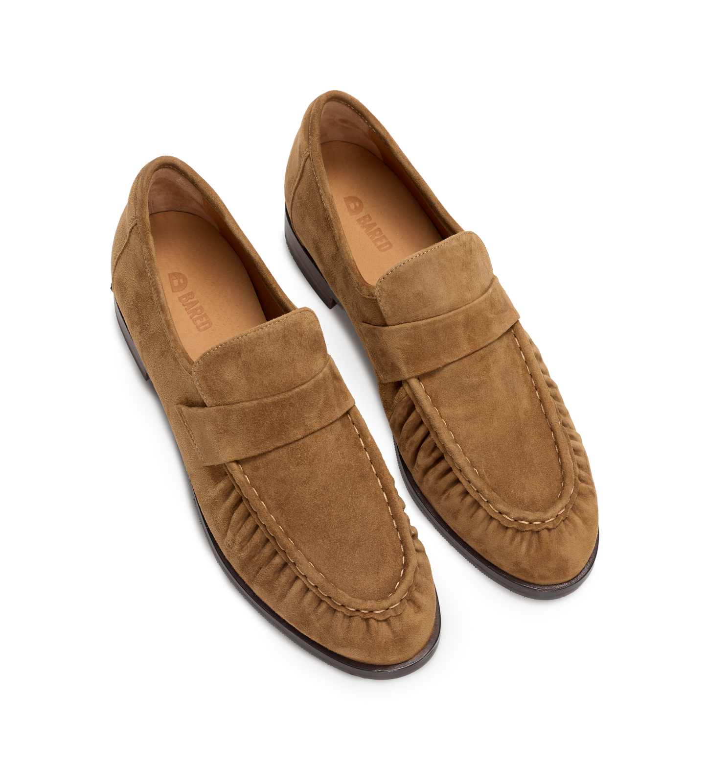 Pair of brown suede loafers on a white background
