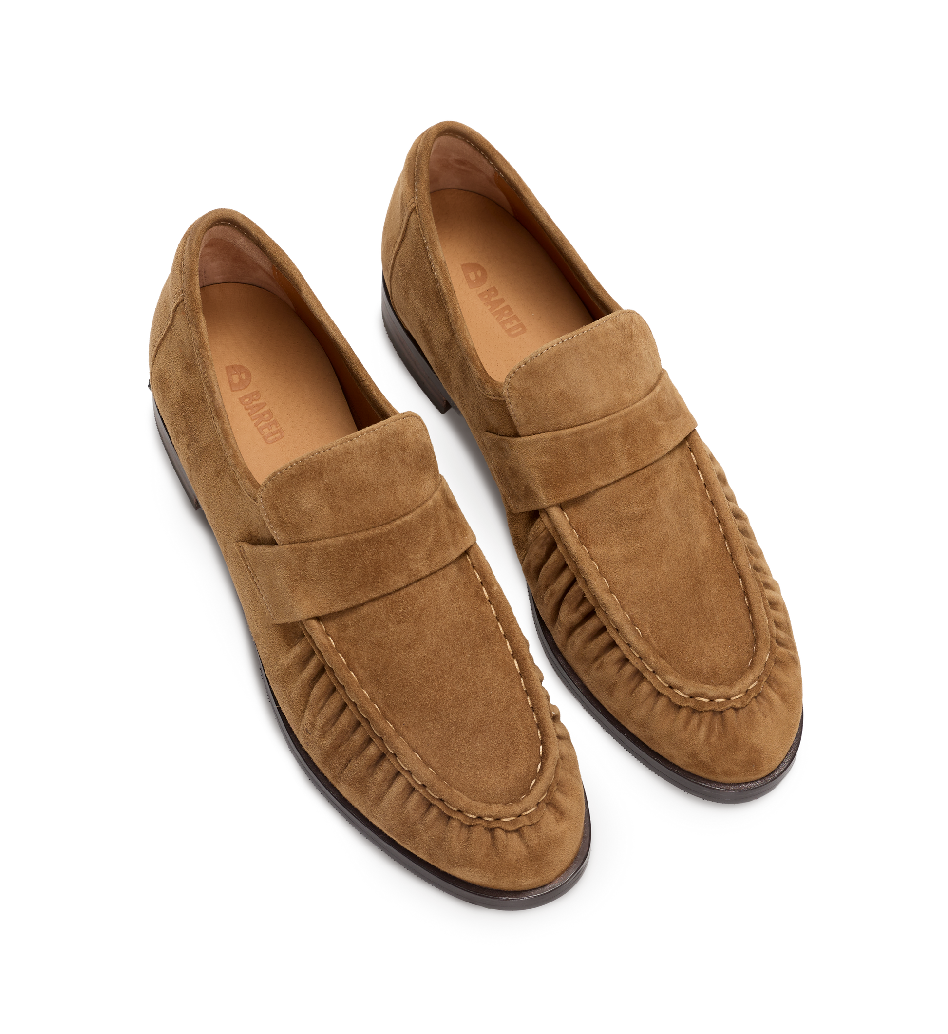 Pair of brown suede loafers on a white background