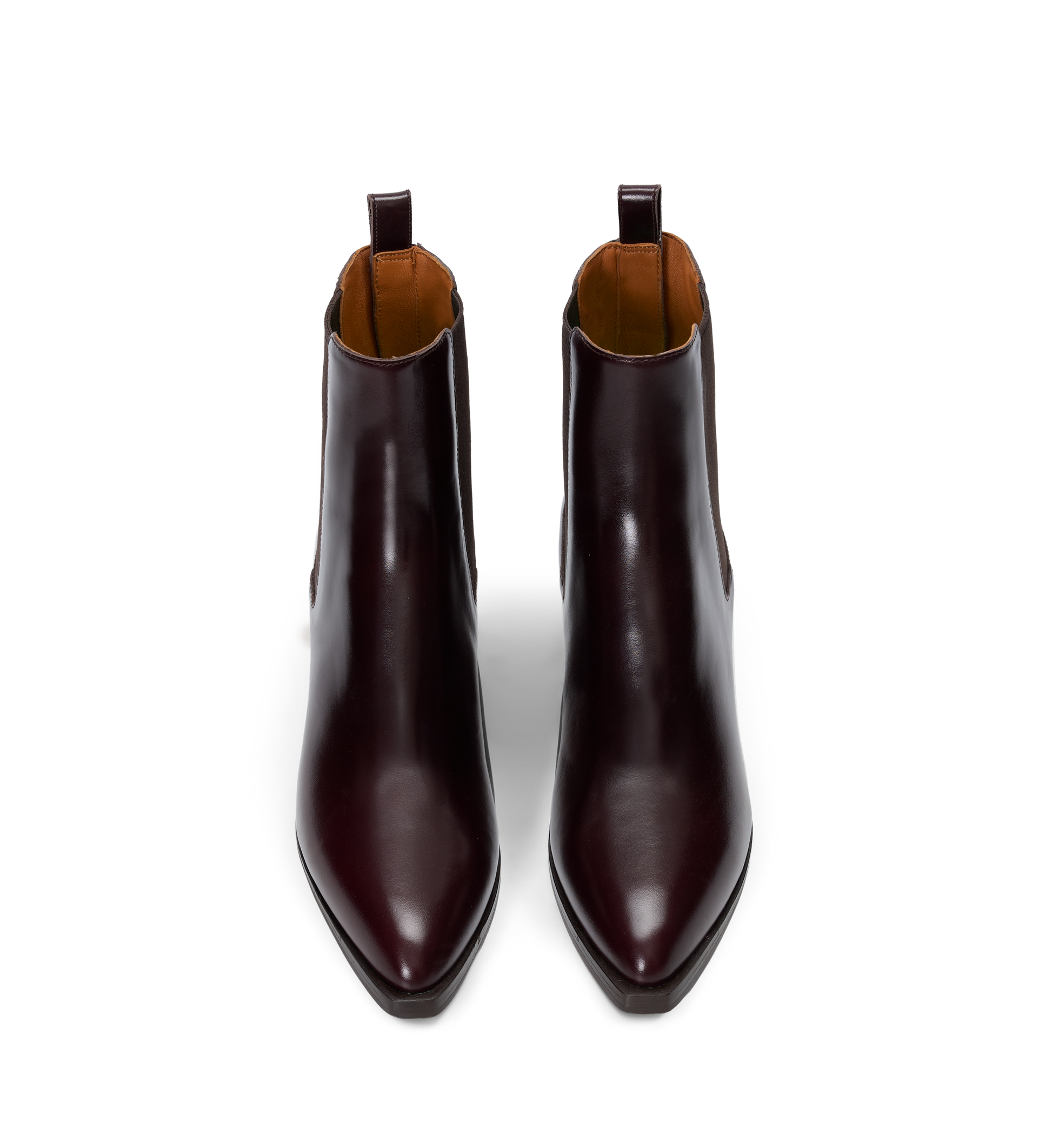 Pair of brown leather ankle boots on a white background