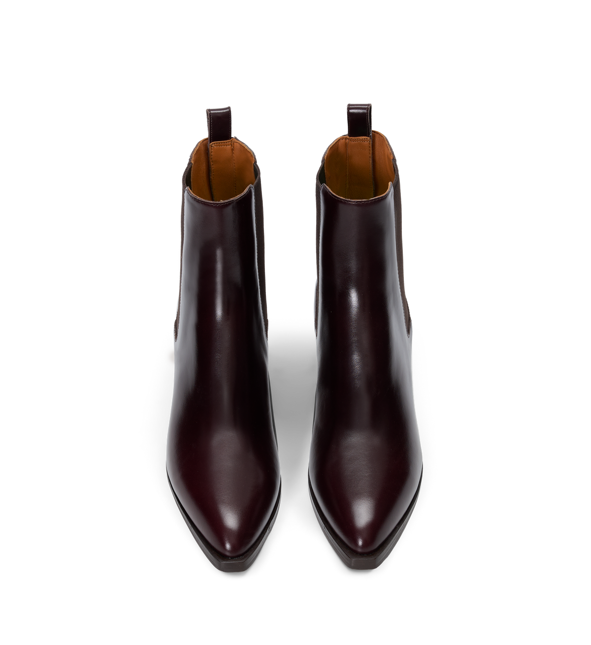 Pair of brown leather ankle boots on a white background