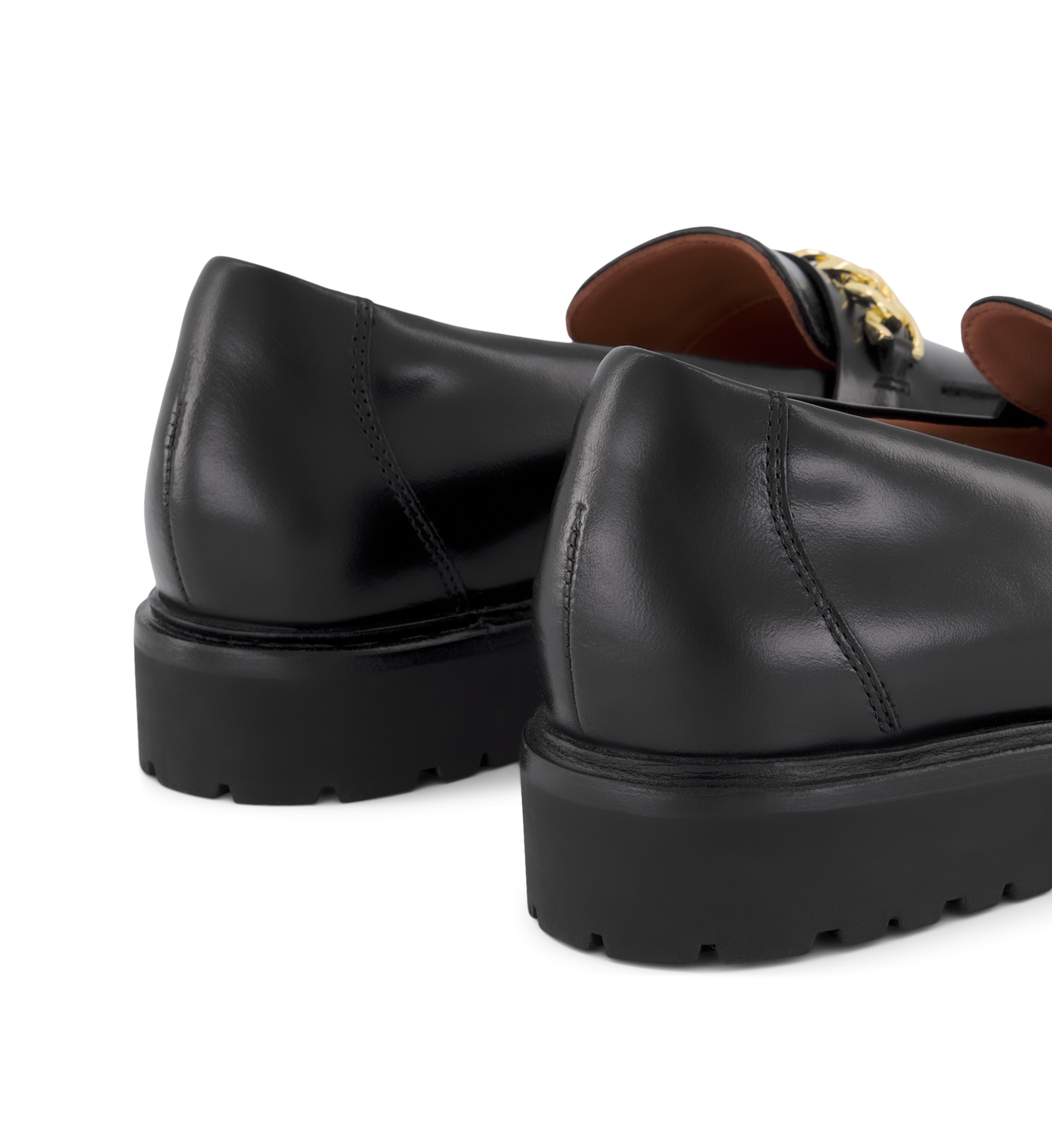 close up on the back of the elaenia black loafers with a chunky sole