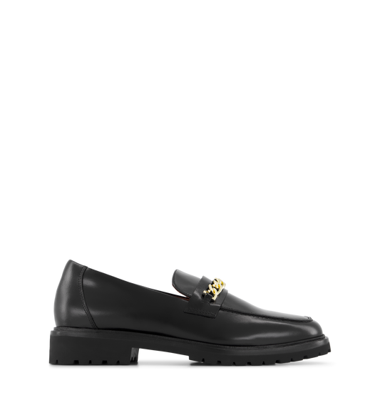 Black leather loafers with gold hardware detail on the vamp.