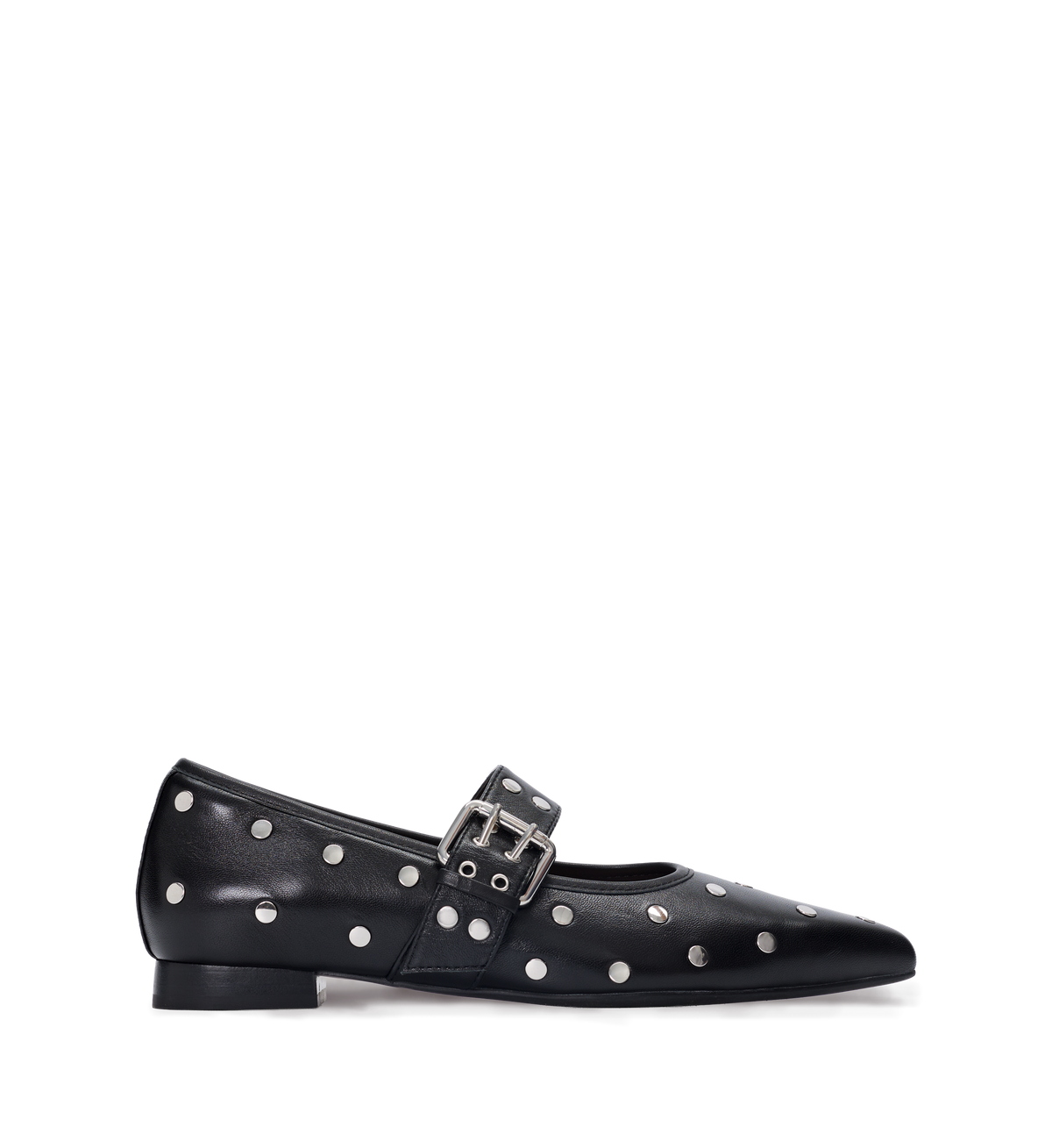 Black leather flat shoe with silver polka dots and a silver buckle on a white background