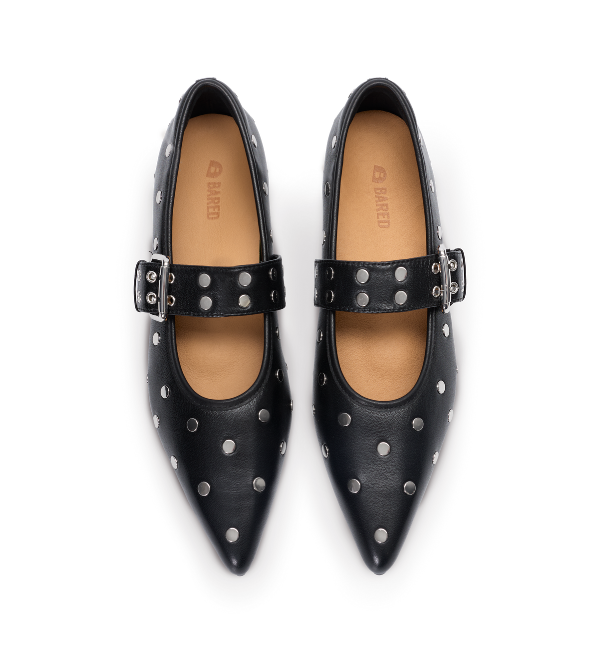 Black pointed-toe shoes with silver polka dots and buckles on a white background