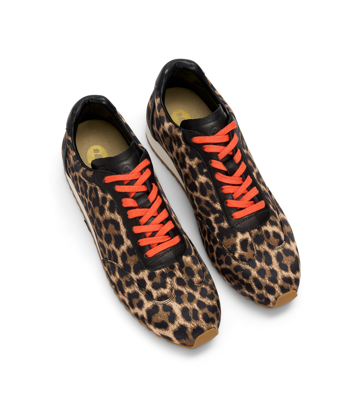 Leopard print sneakers with orange laces on a white background