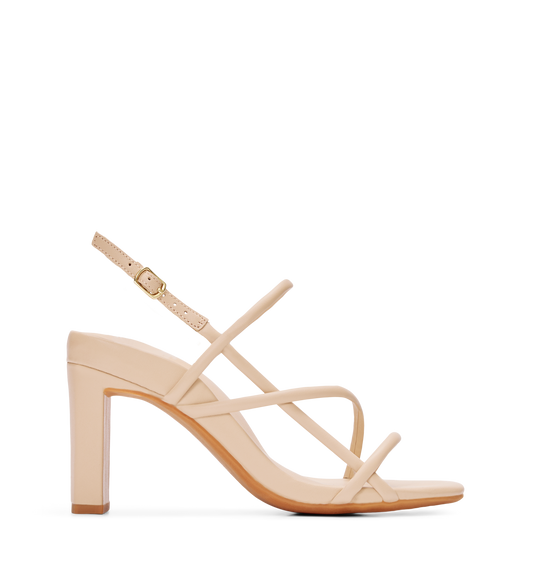 A sand-colored, strappy high heel sandal with an ankle strap and gold hardware.