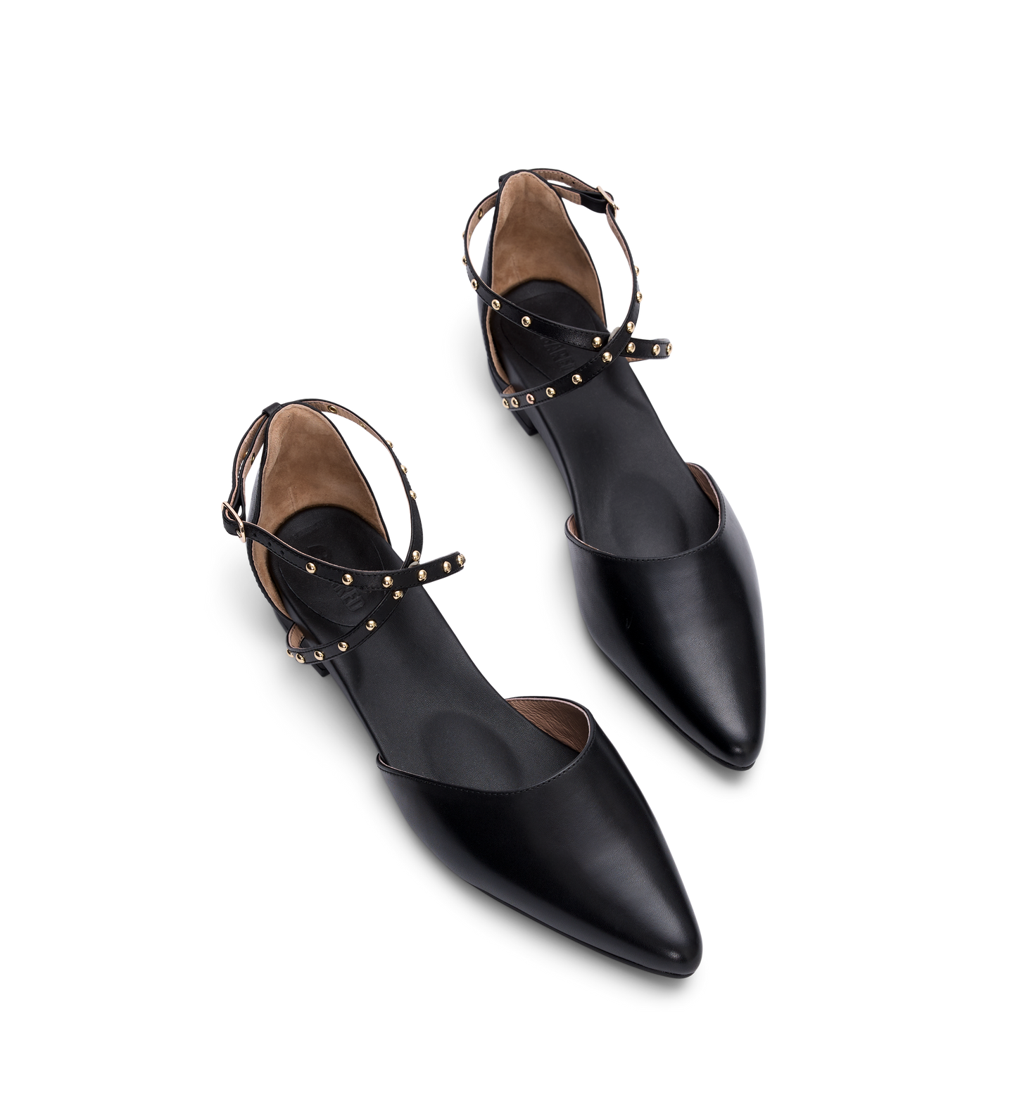 Black pointed-toe shoes with studded details on a white background