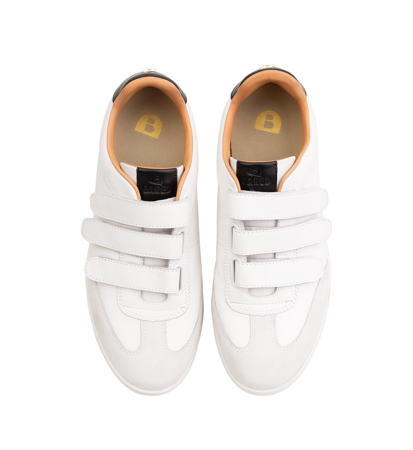 pair of white sneakers with velcro straps