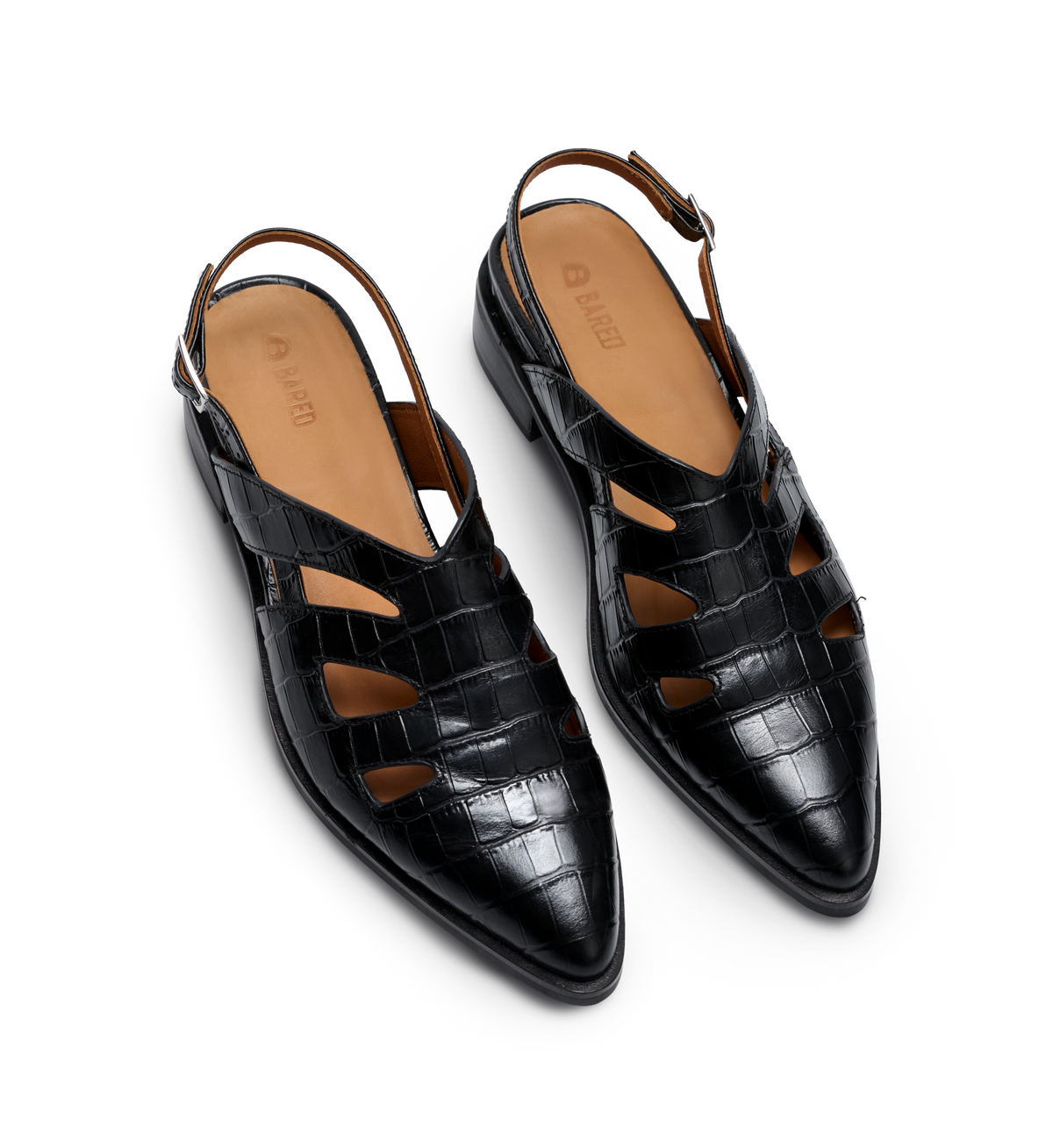Black crocodile-patterned slingback shoes on a white background