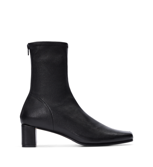 Black stretch leather heeled boots with a back zip and chunky heel.