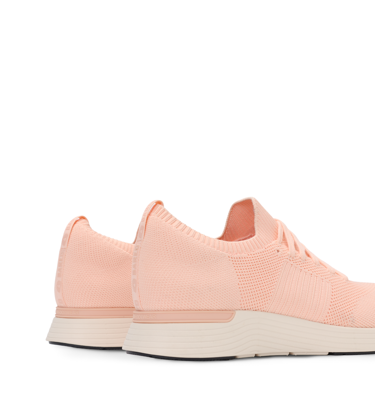 Pair of pink sneakers on a white background