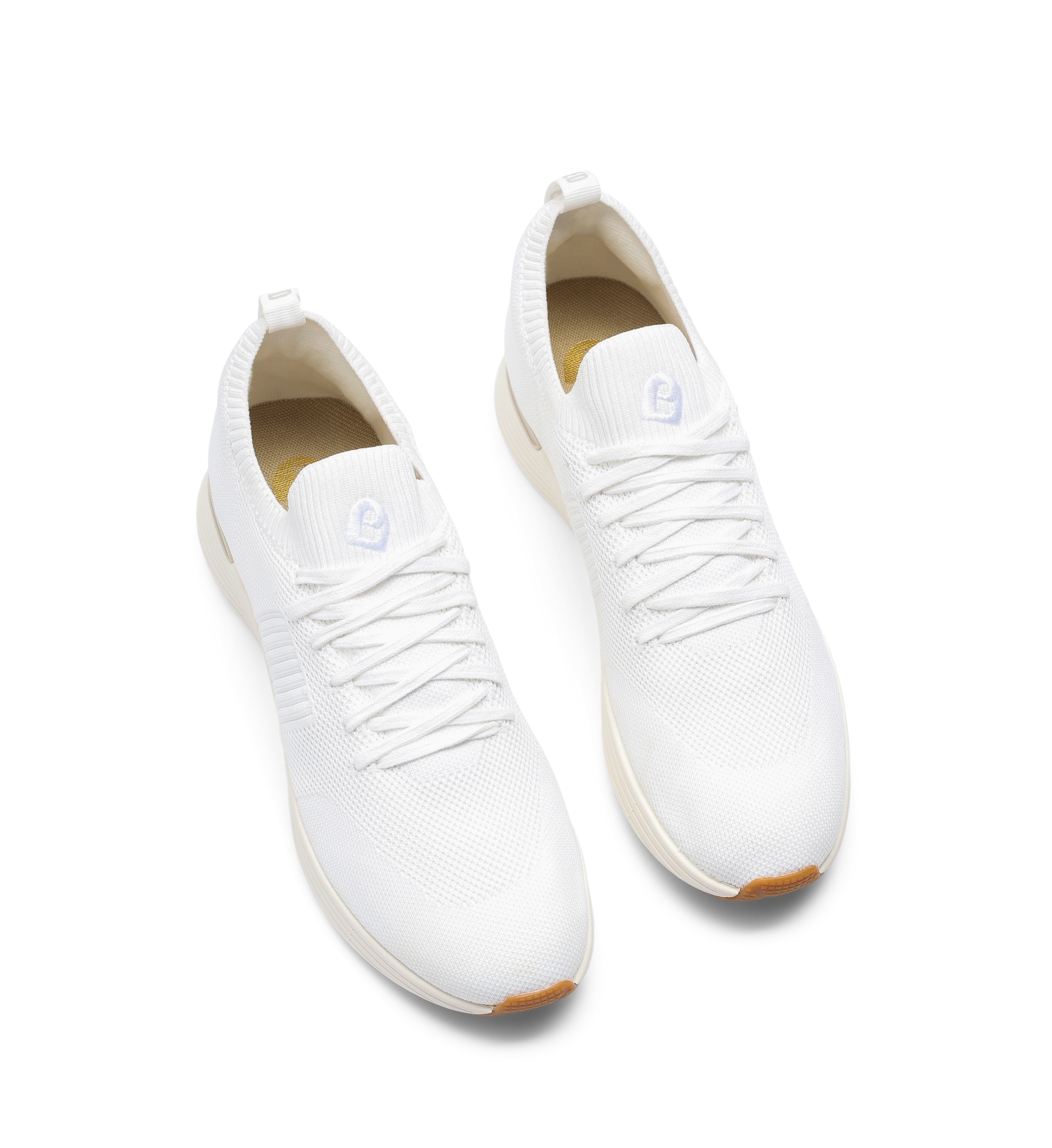 pair of white knit sneakers for women