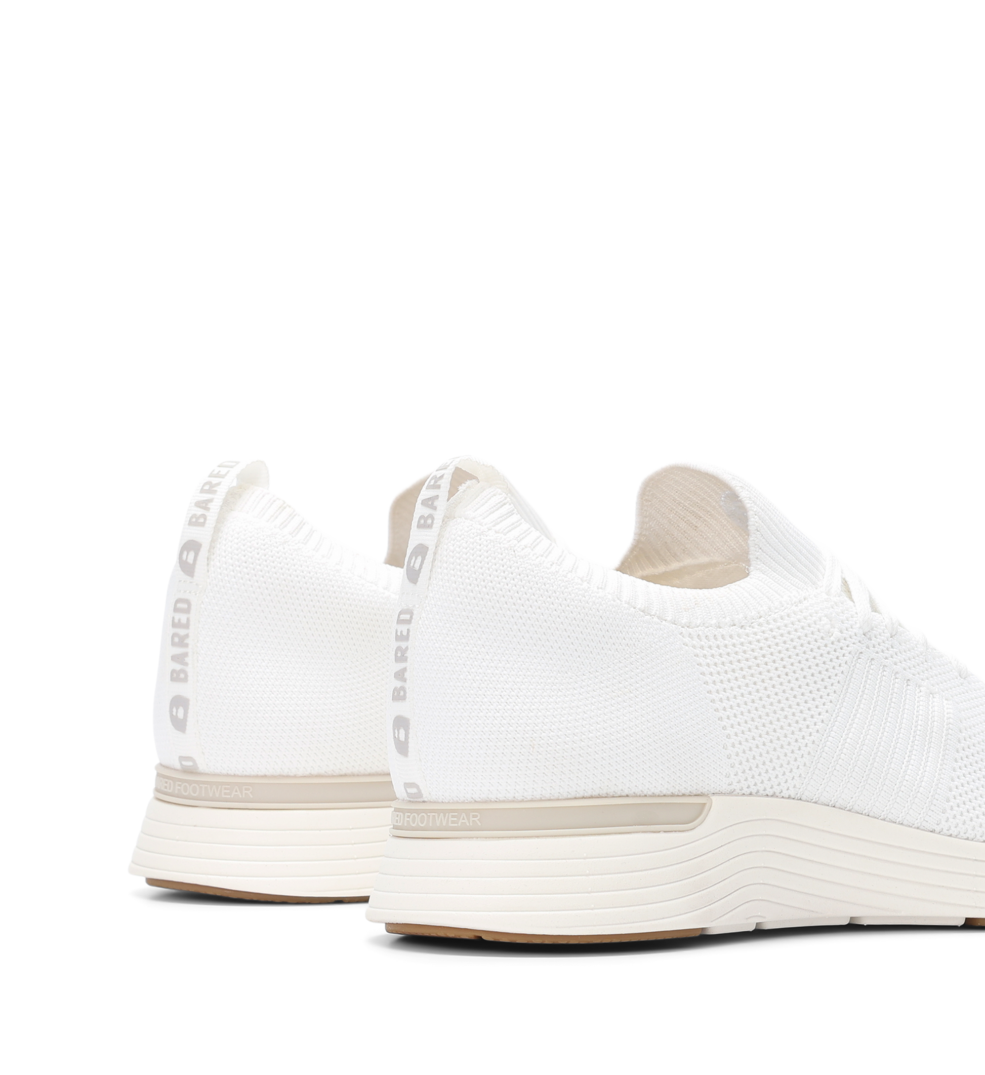close up on the back of the bared footwear jinzo white sneakers