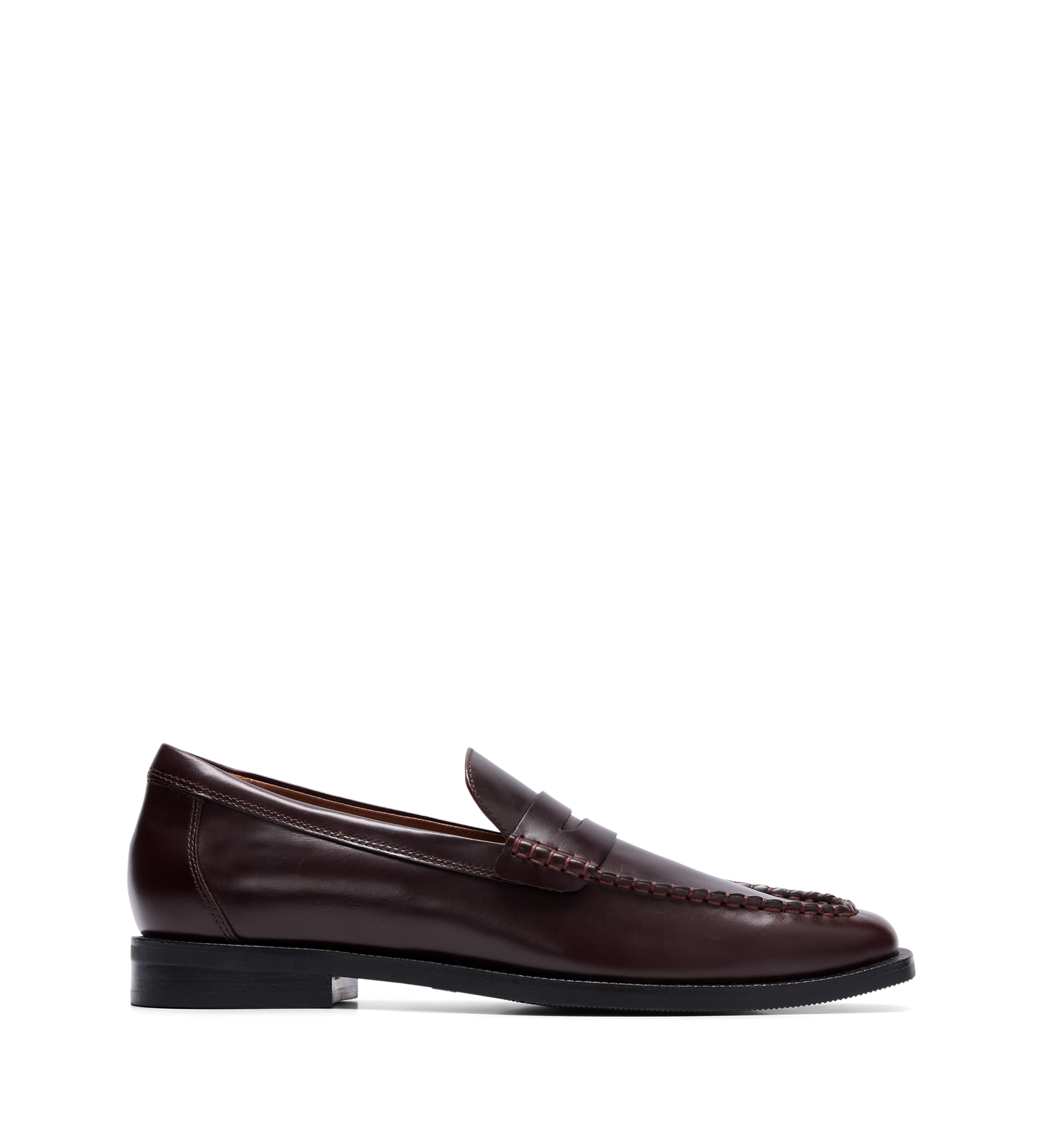 A mahogany brown boxed leather loafer with handstitched detailing and a classic penny strap.