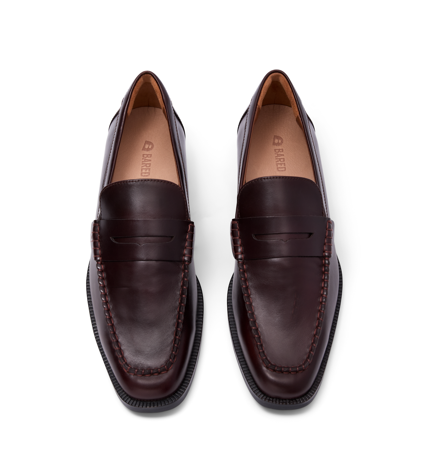 brown leather loafers for women with a penny strap and stitching