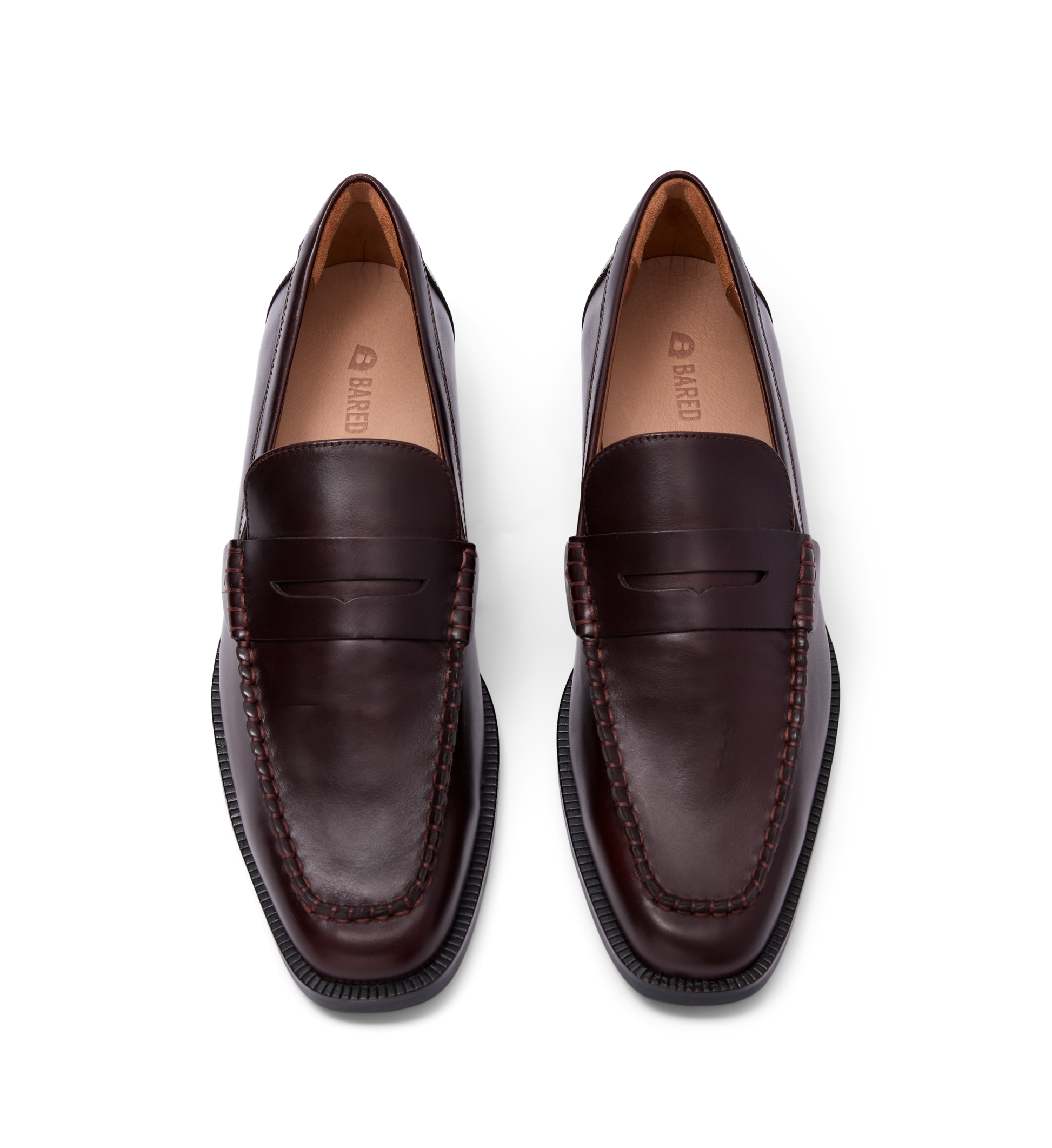 brown leather loafers for women with a penny strap and stitching