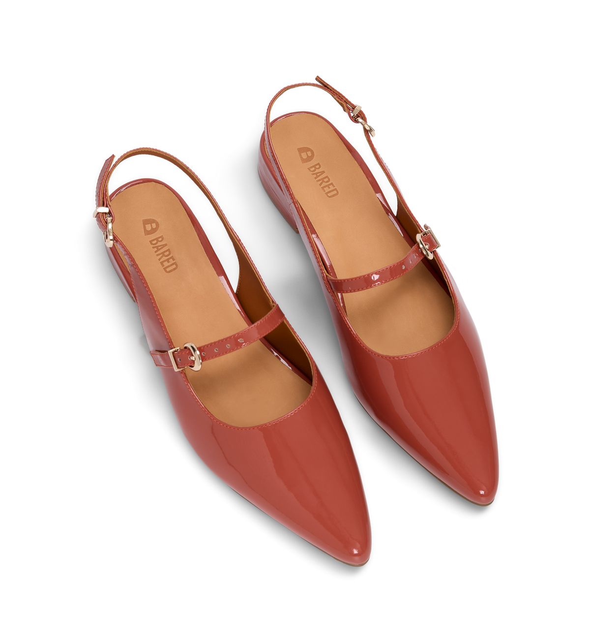 pair of terracotta patent pointed toe flats