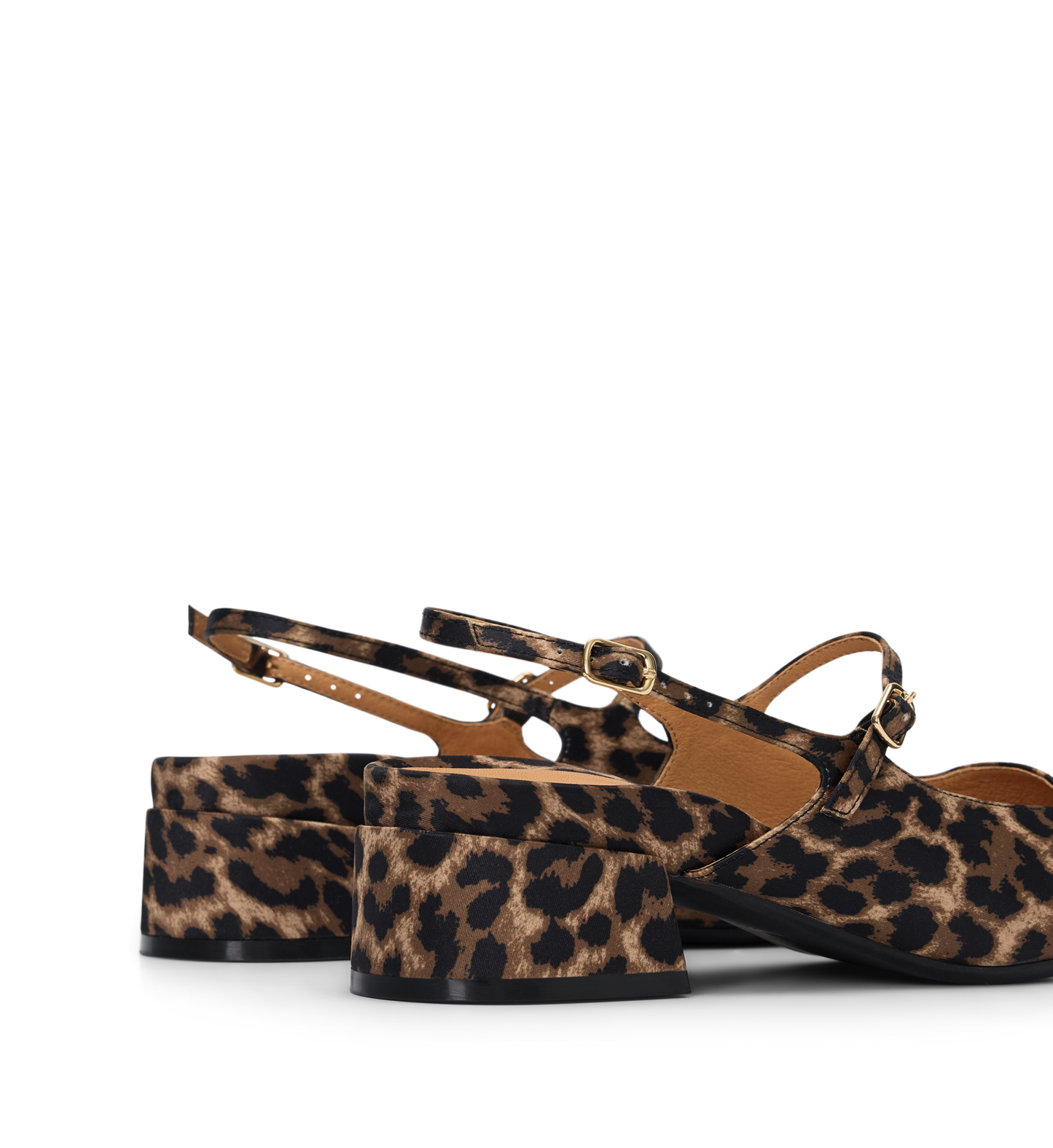 Leopard print platform shoes on a white background