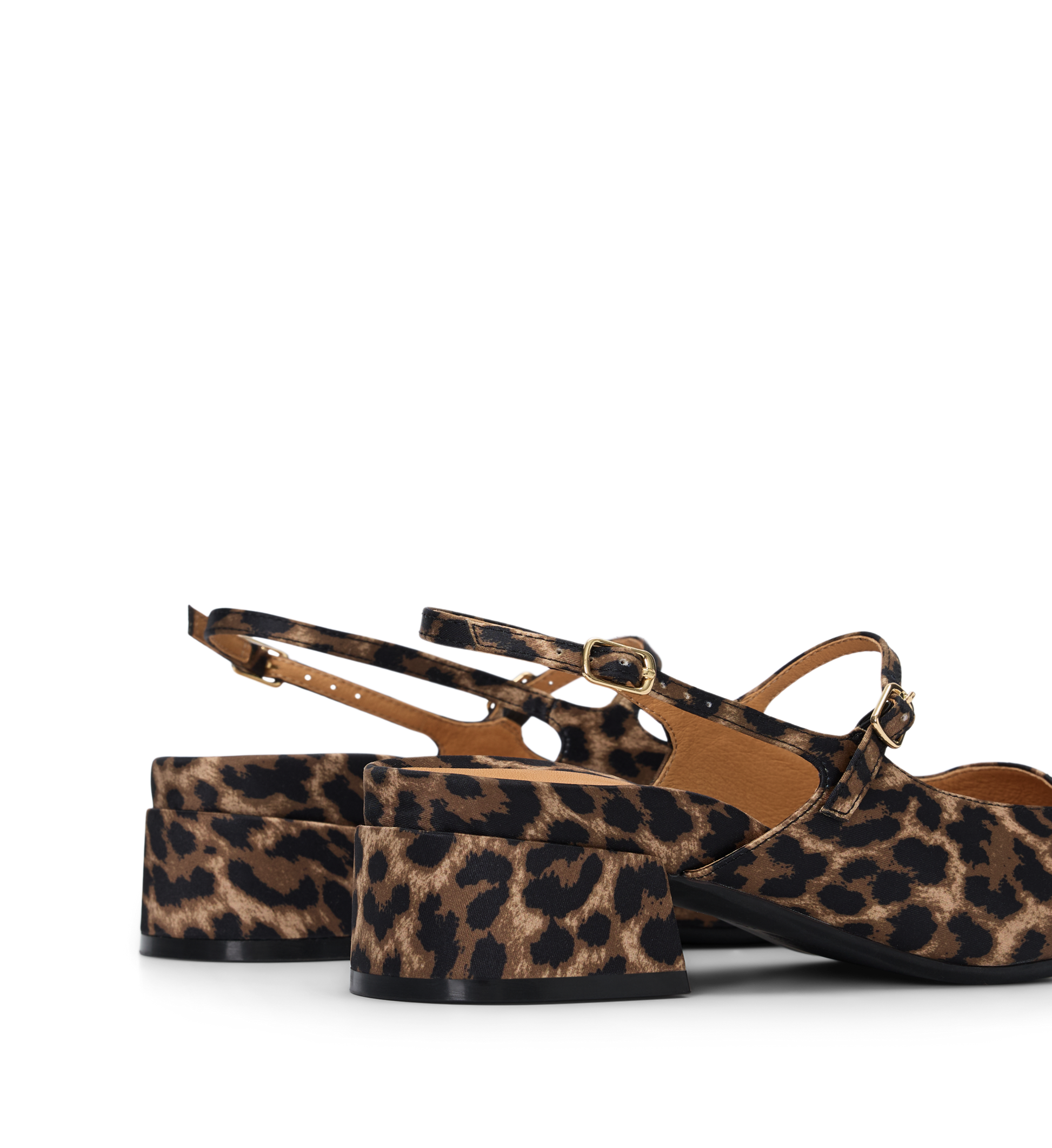 Leopard print platform shoes on a white background